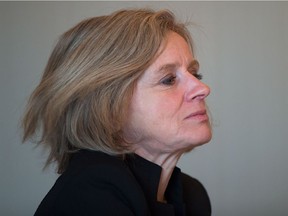 Alberta Premier Rachel Notley flips her hair back off her face during an interview in Vancouver, B.C., on Tuesday December 6, 2016.