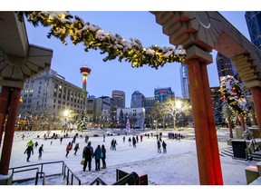 Skaters throng the ice at Olympic Plaza despite the cold and snow in Calgary on Dec. 4, 2016.