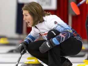 Skip Nadine Chyz yells to her sweepers during the Autumn Gold Curling Classic at the Calgary Curling Club in Calgary, Alta., on Friday, Oct. 9, 2015. It was the 38th year for the event. Lyle Aspinall/Calgary Sun/Postmedia Network