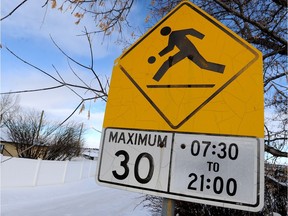 A playground zone sign in Renfrew in NE Calgary, Alta. on Tuesday November 11, 2014. Police are looking into using speed camera's in playground zones in the city. Stuart Dryden/Calgary Sun/QMI Agency