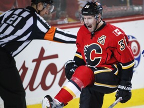 Calgary Flames' Troy Brouwer celebrates his goal during first period NHL hockey action against the Tampa Bay Lightning in Calgary, Wednesday, Dec. 14, 2016.THE CANADIAN PRESS/Jeff McIntosh ORG XMIT: JMC103