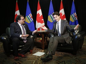Prime Minister Justin Trudeau meets with Calgary Mayor Naheed Nenshi in Calgary on Wednesday, Dec. 21.