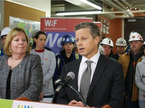 FILE PHOTO: Mick Dilger, president and CEO of Pembina Pipeline, reacts to the province's announcement that the company's petrochemical project was chosen to receive incentives under a program to diversify the Alberta economy.