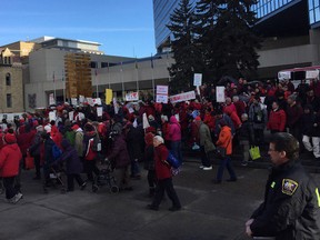 Rally outside city hall regarding the proposed Chinatown development that goes to council Monday.