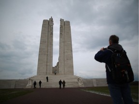 VIMY, FRANCE - MARCH 26:  Visitors walk towards the Canadian National Vimy Memorial on March 26, 2014 in Vimy, France. A number of events will be held this year to commemorate the centenary of the start of World War One.  (Photo by Peter Macdiarmid/Getty Images) ORG XMIT: 483779123
