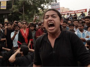 An activist performs street theatre in the film Daughters of Mother India.