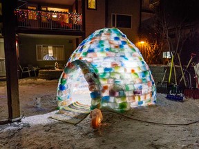 A colourful backyard igloo and some of the tools needed to make it.