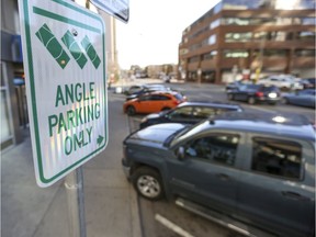 FILE PHOTO: CALGARY, AB — Signage posted indicating "angle parking only" on 9 Street S.W. between 8 and 7 Avenue S.W. in Calgary, on October 23, 2014.
