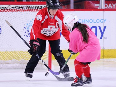 Olympic gold medalist Cassie Campbell-Pascall plays goalie as she helps coach novice level girls in the Scotiabank Girls HockeyFest at the Saddledome in Calgary on Sunday January 8, 2017.