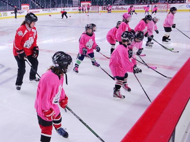 Olympic gold medalist Cassie Campbell-Pascall skates with players as she helps coach novice level girls in the Scotiabank Girls HockeyFest at the Saddledome in Calgary on Sunday January 8, 2017.