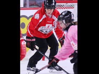 Olympic gold medalist Cassie Campbell-Pascall plays goalie as she helps coach novice level girls in the Scotiabank Girls HockeyFest at the Saddledome in Calgary on Sunday January 8, 2017.