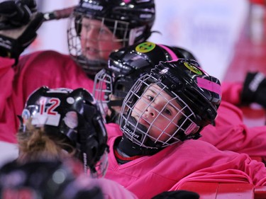 Novice level girls take a break during at the Scotiabank Girls HockeyFest at the Scotiabank Saddledome in Calgary on Sunday January 8, 2017.