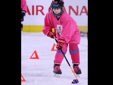 Novice level girls take part in the Scotiabank Girls HockeyFest at the Scotiabank Saddledome in Calgary on Sunday January 8, 2017.