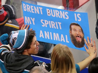 A San Jose Sharks and Brent Burns fan holds up a sign during NHL action against the Calgary Flames at the Scotiabank Saddledome in Calgary on Wednesday January 11, 2017.