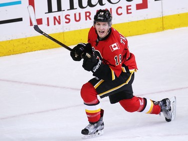 The Calgary Flames' Matthew Tkachuk celebrates scoring on San Jose Sharks goaltender Aaron Dell during NHL action at the Scotiabank Saddledome in Calgary on Wednesday January 11, 2017. Tkachuk's goal tied the score 2-2 in the closing minute of the second period.