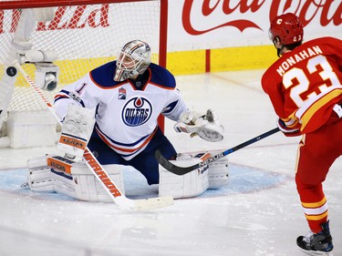 The Calgary Flames' Sean Monahan scores on Edmonton Oilers goaltender Laurent Brossoit during a break away in the third period of during NHL action at the Scotiabank Saddledome in Calgary on Saturday January 21, 2017.