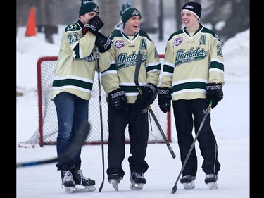 Okotoks Oilers players share laugh during a little shinny at the SKATE THE LAKE fundraiser for Canadian Children’s Brain Cancer Foundation at McKenzie Lake on Sunday January 22, 2017. The foundation was started by John and Shawna Feradi after they lost their eight year-old son Jordan to brain cancer in 2012. Jordan’s determination and the boy’s tireless love of hockey were the inspiration for Skate the Lake, which sees many of Jordan’s hockey and school friends taking part.