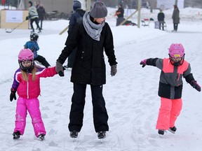 Sandra Jaly and daughters Delilah, left and Tatum take part in the second annual SKATE THE LAKE fundraiser for Canadian Children’s Brain Cancer Foundation at McKenzie Lake on Sunday January 22, 2017. The foundation was started by John and Shawna Feradi after they lost their eight year-old son Jordan to brain cancer in 2012. Jordan’s determination and the boy’s tireless love of hockey were the inspiration for Skate the Lake, which sees many of Jordan’s hockey and school friends taking part.  GAVIN YOUNG/POSTMEDIA