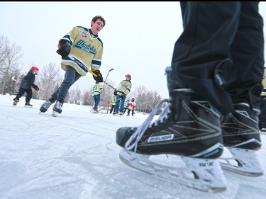 Okotoks Oilers players play some shinny during the second annual SKATE THE LAKE fundraiser for Canadian Children’s Brain Cancer Foundation at McKenzie Lake on on Sunday January 22, 2017. The foundation was started by John and Shawna Feradi after they lost their eight year-old son Jordan to brain cancer in 2012. Jordan’s determination and the boy’s tireless love of hockey were the inspiration for Skate the Lake, which sees many of Jordan’s hockey and school friends taking part.