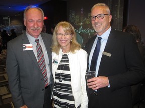 Cal 0128 Tourism 3 A  smiles at Tourism Calgary's annual Open House Jan 19 are Tourism Calgary president and CEO Cindy Ady with Dave Sclanders (left) executive director, Calgary Meetings and Conventions and Tourism Calgary board member Jeff Robinson. The open house is the perfect way to kick off the new year.