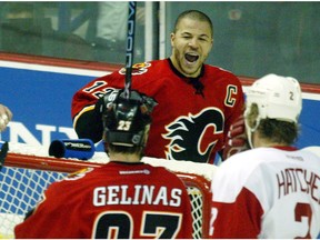 Jarome Iginla celebrate a goal, sans helmet, during the Calgary Flames 2004 run to the Stanley Cup finals. (File)