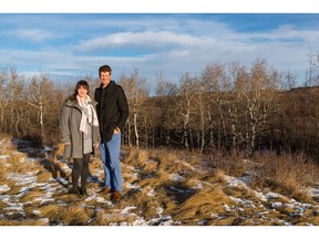 Kalida Goldade and Jared Goldade of WestCreek Developments on the future land for the new southeast community of Wolf Willow.