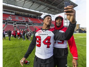 Calgary Stampeders' Frank Beltre takes a selfie with a teammate after a walkthrough ahead of the Grey Cup final at BMO Field in Toronto on Nov. 26, 2016. (Ernest Doroszuk)