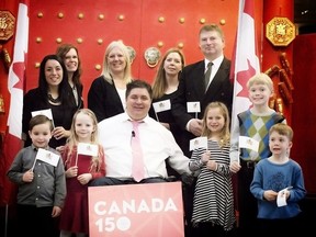 Veterans Affairs Minister Kent Hehr is pictured with Woodlands School students at an announcement for the Canada 150 celebrations at the Calgary Chinese Cultural Centre. The Government of Canada is providing funding for celebratory events in Calgary. Pictured from left (back row): Stephanie Iverson, Julie Hrdlicka (Trustee, CBE), Woodlands School Principal Sheryl Highet, Rosi Morgan, school council chair Scott Eden; (front row): Ezra Iverson, Maisy Morgan, Veterans Affairs Minister Kent Hehr, Berea Iverson, Owen Eden and Jensen Morgan. KERIANNE SPROULE/POSTMEDIA