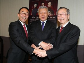 Calgary Ward 4 Councillor Sean Chu, Xinping Wang, Consulate General of the Republic of China in Calgary and Chek Tang, event Chairman, shake hands and pose in Calgary, Alta on Sunday January 15, 2017. The Chinese community of Calgary announced, in celebration of the Chinese New Year 2017, a gala "Legend" performed by the Central Ensemble of National Minorities to take place later in February to celebrate the Chinese New Year. Jim Wells//Postmedia