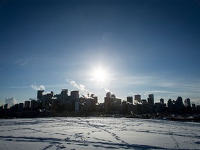 Exhaust plumes from buildings in the downtown core of Calgary last month.