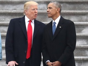 President Donald Trump and former president Barack Obama exchange words at the  U.S. Capitol.