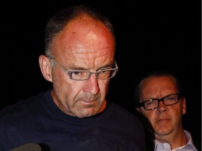 Douglas Garland is taken into custody on July 14, 2014.