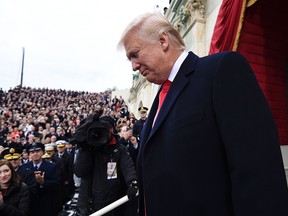US President-elect Donald Trump arrives for his Presidential Inauguration at the US Capitol in Washington, DC, on January 20, 2017. / AFP PHOTO / POOL / SAUL LOEBSAUL LOEB/AFP/Getty Images