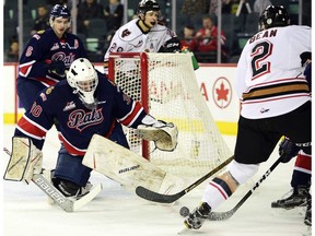 Hitmen d-man Jake Bean tries to make it three goals in the period as the Calgary Hitmen took on the Regina Pats in regular season action on January 27 at the Saddledome. Calgary leads 2-1 after one period of play with Bean scoring both times.