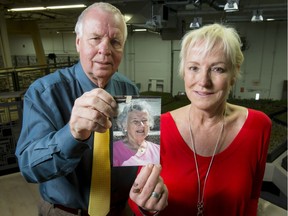 Susan and Mogens Smed hold a photo of family matriarch Lydia Smed at the headquarters for D.I.R.T.T., their family business, in Calgary, Alta., on Tuesday, Jan. 10, 2017. The family's matriarch Lydia Smed died on New Year's Day at the age of 91. Lyle Aspinall/Postmedia Network