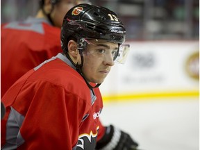 Calgary Flames winger Johnny Gaudreau sits on the side boards during a team practice in Calgary, Alta., on Wednesday, Jan. 11, 2017. Gaudreau is the only Flame selected for this year's NHL All-Star Game, set for the Jan. 27 weekend in Los Angeles.