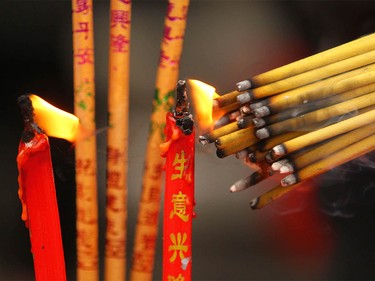 Traditional incense is lit during Chinese Lunar New Year celebrations in downtown Calgary, Alta at the Chinese Cultural Centre on Saturday January 28, 2017. Jim Wells/Postmedia