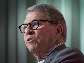 CP Rail's Chief Executive Officer Hunter Harrison speaks to onlookers during the company's annual general meeting at Toronto's Four Seasons Hotel, Wednesday April 20, 2016.