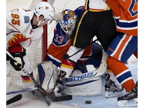 Edmonton Oilers goalie Cam Talbot stops the Calgary Flames' Sam Bennett at Rogers Place in Edmonton on Oct. 12, 2016. The Oilers won 7-4. (David Bloom)