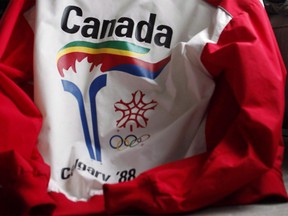 A uniform from the 1988 Olympic torch run. City council has a July deadline to decide on whether to throw its hat in the ring for the 2026 Winter Olympics and Paralympics.