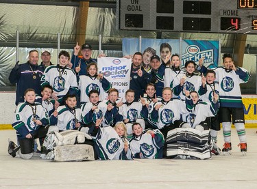 The Mavericks 4 took the Pee Wee 6 championship during Esso Minor Hockey Week.