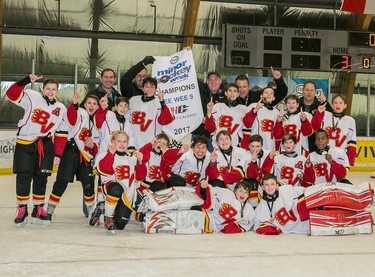 The Bow Valley Flames 8 earned the Pee Wee 9 division crown at Esso Minor Hockey Week.