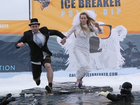 Kelsey (left) and Jill Plett were celebrating their fifth anniversary at the polar dip.
