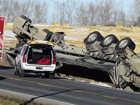 STARS Air Ambulance was called to the scene of a vehicle rollover after a gravel truck tipped north of the intersection of 176th Avenue NE and Range Road 11 near Balzac on January 20. RYAN MCLEOD FOR POSTMEDIA CALGARY