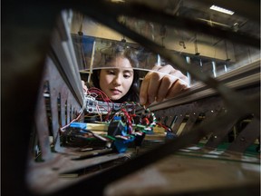 UBC mechanical engineering student Alannah Yip works with a robotics design team that designs robots with senses, artificial intelligence and machine vision.