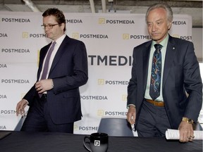 TORONTO, ONTARIO: JANUARY 13, 2015--ANNUAL AGM--Postmedia Network Inc.'s Paul Godfrey-President and CEO (RIGHT) and Doug Lamb-EVP and CFO (LEFT) prior to the AGM at the companies head offices in Toronto, Wednesday January 13, 2015.   [Photo Peter J. Thompson] [For Financial Post story Hollie Shaw/Financial Post] //NATIONAL POST STAFF PHOTO

0114 biz fp postmedia