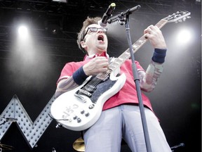 Weezer frontman Rivers Cuomo croons during X-Fest at Fort Calgary in Calgary on Saturday, August 20, 2011. The band will return to Calgary in the spring.