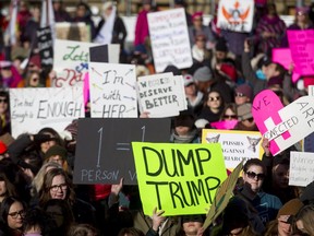 Albertans — including these ones in Calgary — marched in solidarity with the Women’s March in Washington to demonstrate that they are dedicated to protecting women's rights in Canada.