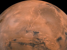 This image provided by NASA shows the planet Mars.