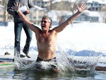 A participant takes an icy dip during the Polar Plunge Calgary on Saturday February 25, 2017, in support of Special Olympics. Leah Hennel/Postmedia